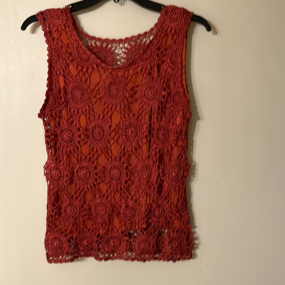 Crochet vest in rust color.  Lined  S/M